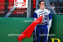 Marshal waves a red flag. 08.07.2022. Formula 1 World Championship, Rd 11, Austrian Grand Prix, Spielberg, Austria, Qualifying Day.