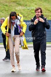 (L to R): Andrea Schlager (AUT) Journalist with her boyfriend Fernando Alonso (ESP) Alpine F1 Team. 08.07.2022. Formula 1 World Championship, Rd 11, Austrian Grand Prix, Spielberg, Austria, Qualifying Day.