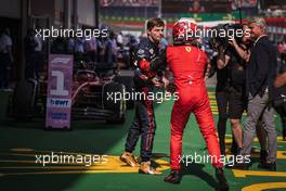 Race winner Charles Leclerc (MON) Ferrari celebrates with second placed Max Verstappen (NLD) Red Bull Racing in parc ferme. 10.07.2022. Formula 1 World Championship, Rd 11, Austrian Grand Prix, Spielberg, Austria, Race Day.