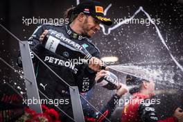 Lewis Hamilton (GBR) Mercedes AMG F1 celebrates his third position on the podium. 10.07.2022. Formula 1 World Championship, Rd 11, Austrian Grand Prix, Spielberg, Austria, Race Day.