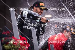 Lewis Hamilton (GBR) Mercedes AMG F1 celebrates his third position on the podium. 10.07.2022. Formula 1 World Championship, Rd 11, Austrian Grand Prix, Spielberg, Austria, Race Day.