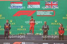 1st place Charles Leclerc (MON) Ferrari F1-75 with 2nd place Max Verstappen (NLD) Red Bull Racing RB18, 3rd place Lewis Hamilton (GBR) Mercedes AMG F1 W13 and  Laurent Mekies (FRA) Ferrari Sporting Director. 10.07.2022. Formula 1 World Championship, Rd 11, Austrian Grand Prix, Spielberg, Austria, Race Day.