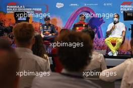 (L to R): Max Verstappen (NLD) Red Bull Racing; Charles Leclerc (MON) Ferrari; and Lewis Hamilton (GBR) Mercedes AMG F1, in the post race FIA Press Conference. 10.07.2022. Formula 1 World Championship, Rd 11, Austrian Grand Prix, Spielberg, Austria, Race Day.
