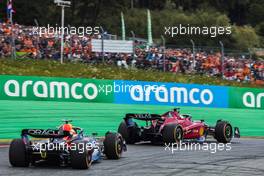 Charles Leclerc (MON) Ferrari F1-75 leads Max Verstappen (NLD) Red Bull Racing RB18. 10.07.2022. Formula 1 World Championship, Rd 11, Austrian Grand Prix, Spielberg, Austria, Race Day.