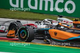 Lando Norris (GBR) McLaren MCL36 and Kevin Magnussen (DEN) Haas VF-22 battle for position. 10.07.2022. Formula 1 World Championship, Rd 11, Austrian Grand Prix, Spielberg, Austria, Race Day.