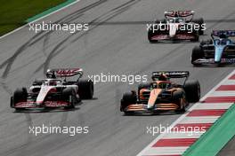 Kevin Magnussen (DEN) Haas VF-22 and Lando Norris (GBR) McLaren MCL36 battle for position. 10.07.2022. Formula 1 World Championship, Rd 11, Austrian Grand Prix, Spielberg, Austria, Race Day.