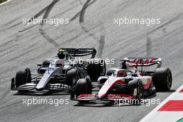 Yuki Tsunoda (JPN) AlphaTauri AT03 and Kevin Magnussen (DEN) Haas VF-22 battle for position. 10.07.2022. Formula 1 World Championship, Rd 11, Austrian Grand Prix, Spielberg, Austria, Race Day.
