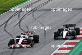 Mick Schumacher (GER) Haas VF-22 and Lewis Hamilton (GBR) Mercedes AMG F1 W13 battle for position. 09.07.2022. Formula 1 World Championship, Rd 11, Austrian Grand Prix, Spielberg, Austria, Sprint Day.