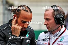 (L to R): Lewis Hamilton (GBR) Mercedes AMG F1 with Marcus Dudley (GBR) Mercedes AMG F1 Performance Engineer on the grid. 09.07.2022. Formula 1 World Championship, Rd 11, Austrian Grand Prix, Spielberg, Austria, Sprint Day.