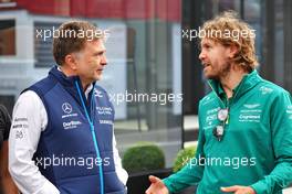 (L to R): Jost Capito (GER) Williams Racing Chief Executive Officer with Sebastian Vettel (GER) Aston Martin F1 Team. 09.07.2022. Formula 1 World Championship, Rd 11, Austrian Grand Prix, Spielberg, Austria, Sprint Day.