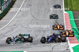 (L to R): Lewis Hamilton (GBR) Mercedes AMG F1 W13 and Alexander Albon (THA) Williams Racing FW44 battle for position. 09.07.2022. Formula 1 World Championship, Rd 11, Austrian Grand Prix, Spielberg, Austria, Sprint Day.