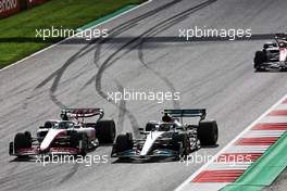 Mick Schumacher (GER) Haas VF-22 and Lewis Hamilton (GBR) Mercedes AMG F1 W13 battle for position ahead of Valtteri Bottas (FIN) Alfa Romeo F1 Team C42. 09.07.2022. Formula 1 World Championship, Rd 11, Austrian Grand Prix, Spielberg, Austria, Sprint Day.