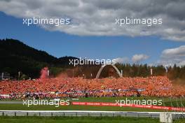 Max Verstappen (NLD) Red Bull Racing RB18 and Dutch fans. 09.07.2022. Formula 1 World Championship, Rd 11, Austrian Grand Prix, Spielberg, Austria, Sprint Day.