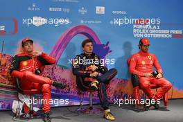 (L to R): Charles Leclerc (MON) Ferrari; Max Verstappen (NLD) Red Bull Racing; and Carlos Sainz Jr (ESP) Ferrari, in the FIA Press Conference. 09.07.2022. Formula 1 World Championship, Rd 11, Austrian Grand Prix, Spielberg, Austria, Sprint Day.