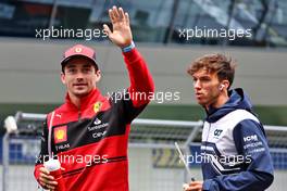 (L to R): Charles Leclerc (MON) Ferrari and Pierre Gasly (FRA) AlphaTauri on the drivers parade. 10.07.2022. Formula 1 World Championship, Rd 11, Austrian Grand Prix, Spielberg, Austria, Race Day.