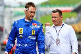 (L to R): Mathias Lauda (AUT) with Christian Klien (AUT). 10.07.2022. Formula 1 World Championship, Rd 11, Austrian Grand Prix, Spielberg, Austria, Race Day.