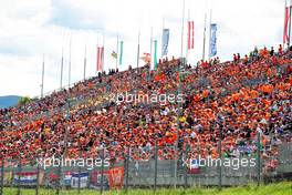 Circuit atmosphere - fans in the grandstands. 10.07.2022. Formula 1 World Championship, Rd 11, Austrian Grand Prix, Spielberg, Austria, Race Day.
