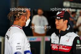 (L to R): Lewis Hamilton (GBR) Mercedes AMG F1 with Guanyu Zhou (CHN) Alfa Romeo F1 Team. 07.07.2022. Formula 1 World Championship, Rd 11, Austrian Grand Prix, Spielberg, Austria, Preparation Day.