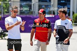 (L to R): George Russell (GBR) Mercedes AMG F1 with Carlos Sainz Jr (ESP) Ferrari and Pierre Gasly (FRA) AlphaTauri. 10.06.2022. Formula 1 World Championship, Rd 8, Azerbaijan Grand Prix, Baku Street Circuit, Azerbaijan, Practice Day.