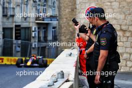 Circuit atmosphere - Police watch Max Verstappen (NLD) Red Bull Racing RB18. 10.06.2022. Formula 1 World Championship, Rd 8, Azerbaijan Grand Prix, Baku Street Circuit, Azerbaijan, Practice Day.