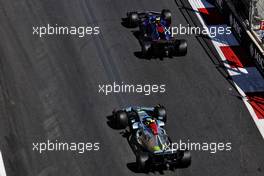 Nicholas Latifi (CDN) Williams Racing FW44 and Lewis Hamilton (GBR) Mercedes AMG F1 W13. 10.06.2022. Formula 1 World Championship, Rd 8, Azerbaijan Grand Prix, Baku Street Circuit, Azerbaijan, Practice Day.