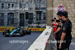 Circuit atmosphere - Police watch Lance Stroll (CDN) Aston Martin F1 Team AMR22. 10.06.2022. Formula 1 World Championship, Rd 8, Azerbaijan Grand Prix, Baku Street Circuit, Azerbaijan, Practice Day.