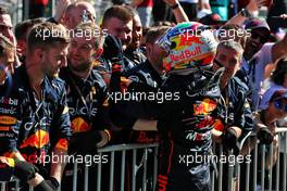 Sergio Perez (MEX) Red Bull Racing celebrates his second position in parc ferme with the team. 12.06.2022. Formula 1 World Championship, Rd 8, Azerbaijan Grand Prix, Baku Street Circuit, Azerbaijan, Race Day.