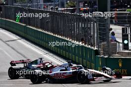 Kevin Magnussen (DEN) Haas VF-22 and Valtteri Bottas (FIN) Alfa Romeo F1 Team C42. 12.06.2022. Formula 1 World Championship, Rd 8, Azerbaijan Grand Prix, Baku Street Circuit, Azerbaijan, Race Day.