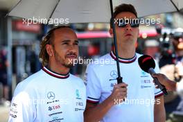 (L to R): Lewis Hamilton (GBR) Mercedes AMG F1 with team mate George Russell (GBR) Mercedes AMG F1. 12.06.2022. Formula 1 World Championship, Rd 8, Azerbaijan Grand Prix, Baku Street Circuit, Azerbaijan, Race Day.
