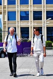Lando Norris (GBR) McLaren (Right) with Mark Berryman (GBR) Add Motorsports Director and Driver Manager. 09.06.2022. Formula 1 World Championship, Rd 8, Azerbaijan Grand Prix, Baku Street Circuit, Azerbaijan, Preparation Day.