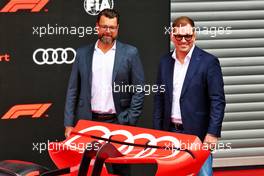 (L to R): Oliver Hoffmann (GER) Audi Member of the Board of Management for Technical Development and Markus Duesmann  (GER) Audi Chief Executive Officer with a showcar in the pits as Audi has officially registered as an F1 engine manufacturer for the 2026 regulations. 26.08.2022. Formula 1 World Championship, Rd 14, Belgian Grand Prix, Spa Francorchamps, Belgium, Practice Day.