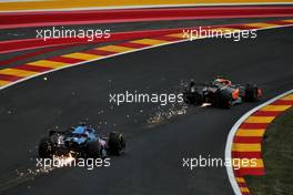 Max Verstappen (NLD) Red Bull Racing RB18 and Fernando Alonso (ESP) Alpine F1 Team A522 send sparks flying. 26.08.2022. Formula 1 World Championship, Rd 14, Belgian Grand Prix, Spa Francorchamps, Belgium, Practice Day.