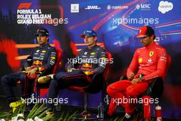 (L to R): Sergio Perez (MEX) Red Bull Racing; Max Verstappen (NLD) Red Bull Racing; and Carlos Sainz Jr (ESP) Ferrari, in the post race FIA Press Conference. 28.08.2022. Formula 1 World Championship, Rd 14, Belgian Grand Prix, Spa Francorchamps, Belgium, Race Day.