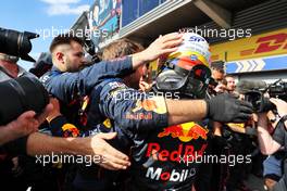 Sergio Perez (MEX) Red Bull Racing celebrates his second position with the team in parc ferme. 28.08.2022. Formula 1 World Championship, Rd 14, Belgian Grand Prix, Spa Francorchamps, Belgium, Race Day.