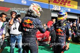 (L to R): Race winner Max Verstappen (NLD) Red Bull Racing celebrates with second placed team mate Sergio Perez (MEX) Red Bull Racing in parc ferme. 28.08.2022. Formula 1 World Championship, Rd 14, Belgian Grand Prix, Spa Francorchamps, Belgium, Race Day.