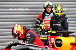 Lewis Hamilton (GBR) Mercedes AMG F1 and Carlos Sainz Jr (ESP) Ferrari F1-75 in parc ferme. 27.08.2022. Formula 1 World Championship, Rd 14, Belgian Grand Prix, Spa Francorchamps, Belgium, Qualifying Day.