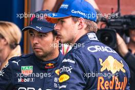 (L to R): Sergio Perez (MEX) Red Bull Racing with team mate Max Verstappen (NLD) Red Bull Racing in qualifying parc ferme. 27.08.2022. Formula 1 World Championship, Rd 14, Belgian Grand Prix, Spa Francorchamps, Belgium, Qualifying Day.