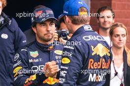 (L to R): Sergio Perez (MEX) Red Bull Racing with team mate Max Verstappen (NLD) Red Bull Racing in qualifying parc ferme. 27.08.2022. Formula 1 World Championship, Rd 14, Belgian Grand Prix, Spa Francorchamps, Belgium, Qualifying Day.