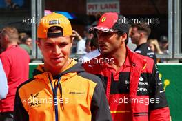 Lando Norris (GBR) McLaren and Carlos Sainz Jr (ESP) Ferrari on the drivers parade. 28.08.2022. Formula 1 World Championship, Rd 14, Belgian Grand Prix, Spa Francorchamps, Belgium, Race Day.