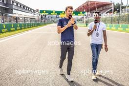 (L to R): Alexander Albon (THA) Williams Racing withLawrence Barretto (GBR) Formula 1 Senior Writer Editor. 25.08.2022. Formula 1 World Championship, Rd 14, Belgian Grand Prix, Spa Francorchamps, Belgium, Preparation Day.