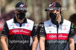 Valtteri Bottas (FIN), Alfa Romeo Racing and Guanyu Zhou (CHI), Alfa Romeo Racing  18.03.2022. Formula 1 World Championship, Rd 1, Bahrain Grand Prix, Sakhir, Bahrain, Practice Day