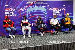 (L to R): Carlos Sainz Jr (ESP) Ferrari; Valtteri Bottas (FIN) Alfa Romeo F1 Team; Sergio Perez (MEX) Red Bull Racing; Kevin Magnussen (DEN) Haas F1 Team; and Daniel Ricciardo (AUS) McLaren, in the FIA Press Conference. 18.03.2022. Formula 1 World Championship, Rd 1, Bahrain Grand Prix, Sakhir, Bahrain, Practice Day