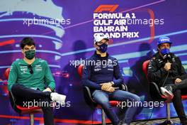 (L to R): Lance Stroll (CDN) Aston Martin F1 Team; Nicholas Latifi (CDN) Williams Racing; and Fernando Alonso (ESP) Alpine F1 Team, in the FIA Press Conference. 18.03.2022. Formula 1 World Championship, Rd 1, Bahrain Grand Prix, Sakhir, Bahrain, Practice Day
