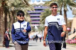 (L to R): Yuki Tsunoda (JPN) AlphaTauri with trm Pierre Gasly (FRA) AlphaTauri. 18.03.2022. Formula 1 World Championship, Rd 1, Bahrain Grand Prix, Sakhir, Bahrain, Practice Day
