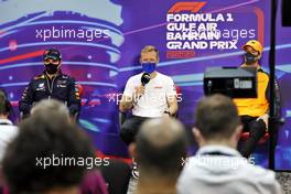 (L to R): Sergio Perez (MEX) Red Bull Racing; Kevin Magnussen (DEN) Haas F1 Team; and Daniel Ricciardo (AUS) McLaren, in the FIA Press Conference. 18.03.2022. Formula 1 World Championship, Rd 1, Bahrain Grand Prix, Sakhir, Bahrain, Practice Day