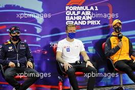(L to R):Sergio Perez (MEX) Red Bull Racing; Kevin Magnussen (DEN) Haas F1 Team; and Daniel Ricciardo (AUS) McLaren, in the FIA Press Conference. 18.03.2022. Formula 1 World Championship, Rd 1, Bahrain Grand Prix, Sakhir, Bahrain, Practice Day