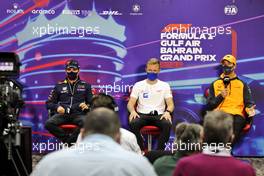 (L to R): Sergio Perez (MEX) Red Bull Racing; Kevin Magnussen (DEN) Haas F1 Team; and Daniel Ricciardo (AUS) McLaren, in the FIA Press Conference. 18.03.2022. Formula 1 World Championship, Rd 1, Bahrain Grand Prix, Sakhir, Bahrain, Practice Day