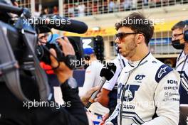 Pierre Gasly (FRA) AlphaTauri on the grid. 20.03.2022. Formula 1 World Championship, Rd 1, Bahrain Grand Prix, Sakhir, Bahrain, Race Day.