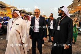 (L to R): Crown Prince Shaikh Salman bin Isa Hamad Al Khalifa (BRN) with Stefano Domenicali (ITA) Formula One President and CEO on the grid. 20.03.2022. Formula 1 World Championship, Rd 1, Bahrain Grand Prix, Sakhir, Bahrain, Race Day.
