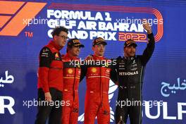 The podium (L to R): Mattia Binotto (ITA) Ferrari Team Principal; Carlos Sainz Jr (ESP) Ferrari, second; Charles Leclerc (MON) Ferrari, race winner; Lewis Hamilton (GBR) Mercedes AMG F1, third. 20.03.2022. Formula 1 World Championship, Rd 1, Bahrain Grand Prix, Sakhir, Bahrain, Race Day.